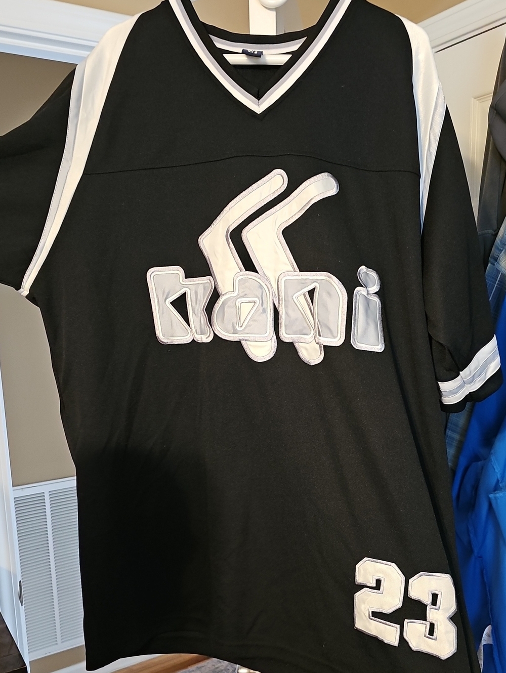 Black  and White Athletic Jersey with KANI Logo worn Maybe 2 Times.